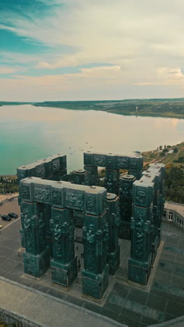 aerial view of the chronicle of georgia monument overlooking the tbilisi sea