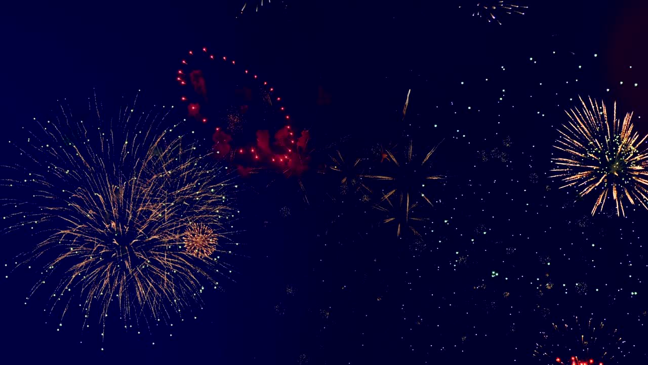 fuegos artificiales dorados explotan en una fiesta.