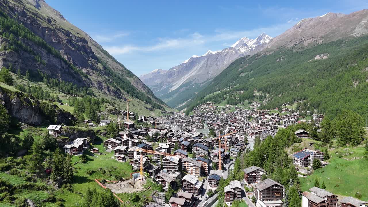 Ascending drone,aerial Zermatt town summer, Swizerland