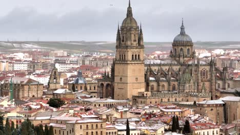 The-iconic-Cathedral-of-Salamanca,-aerial-view-in-a-winter-day