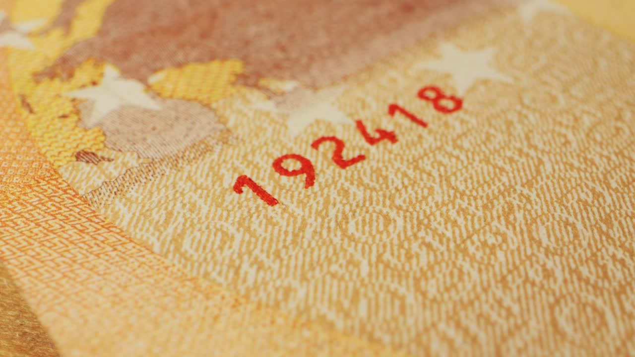 Fifty euro banknotes close-up. European currency EUR, EU Central Bank. 50 euro money macro. Economy, financial and banking concept in European union.