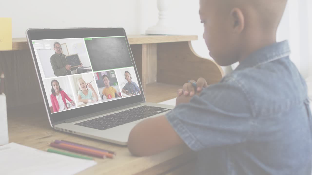 Child watching laptop grid in class to answer teacher while HUD sweeping across laptop