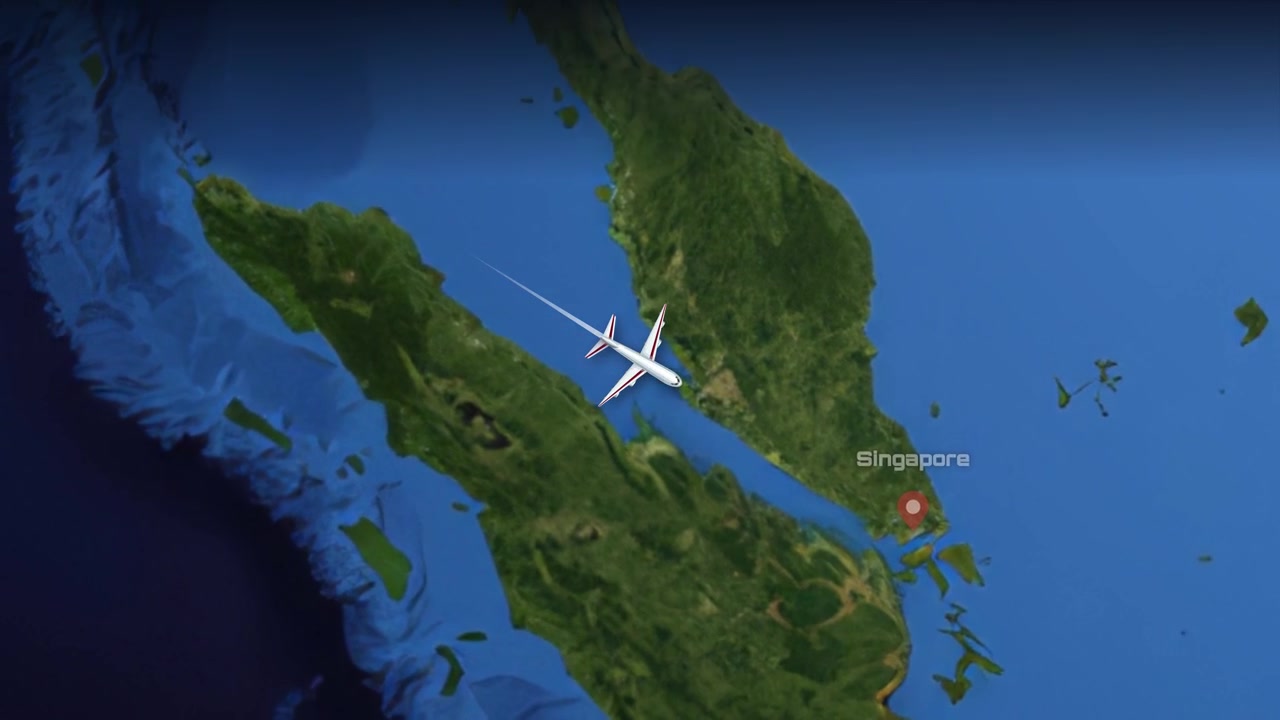 Satellite map animation tracks a commercial airplane flying from Mumbai, India to Singapore