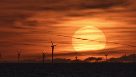 offshore wind farm and beautiful sunset