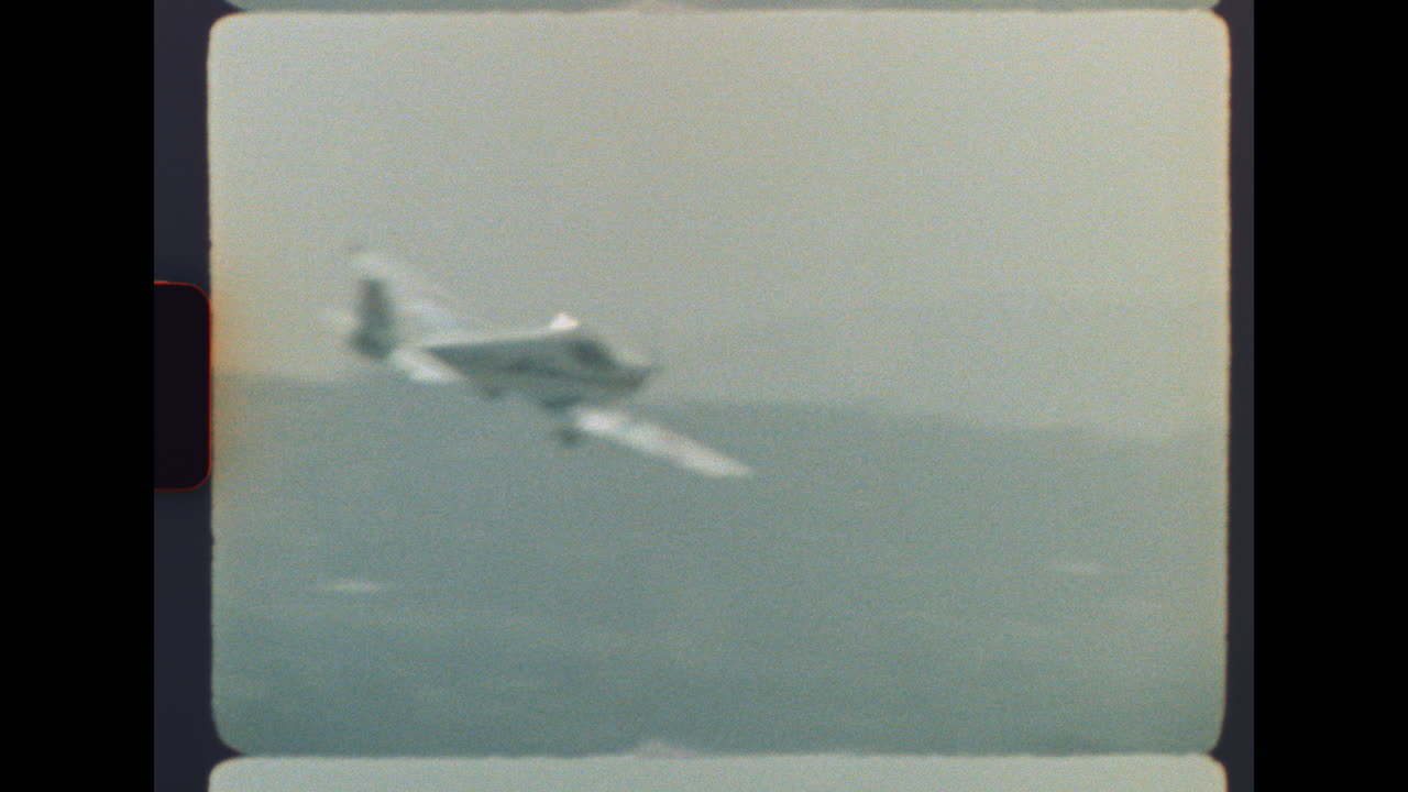 Vintage Film Airplane in Sky