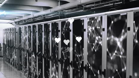 hearts and network connections animation over server racks in data center
