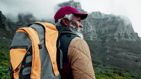 man hiking in the mountains