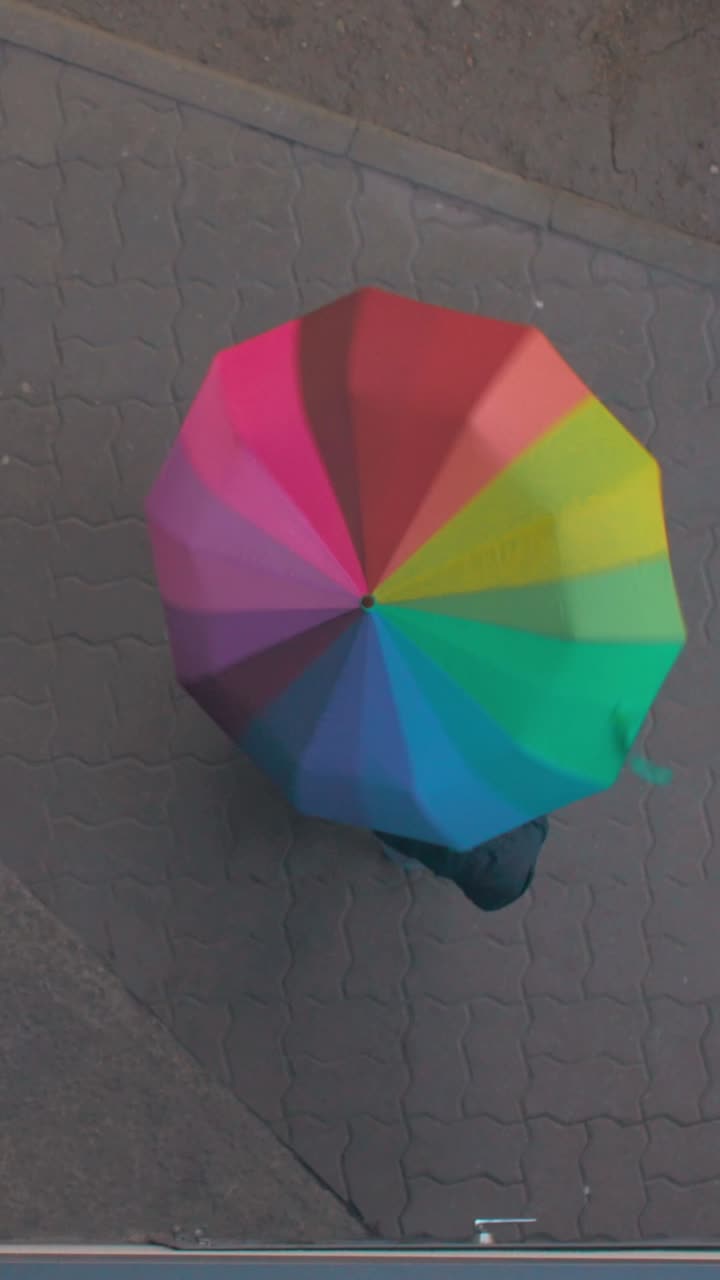 Colorful Umbrella on a Grey Street