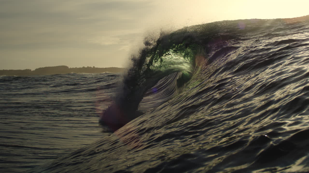 Slow Motion Ocean Wave Breaking at Golden Hour