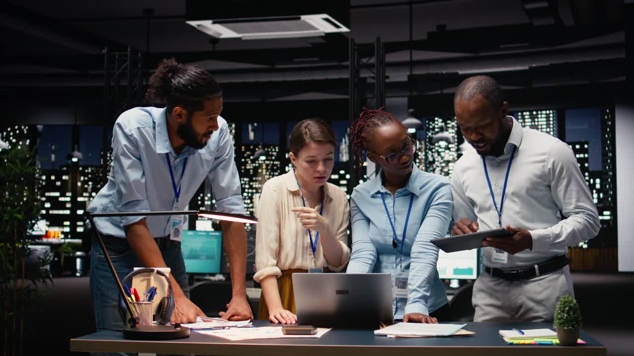 Multiethnic business team engaged in collaborative teamwork inside office