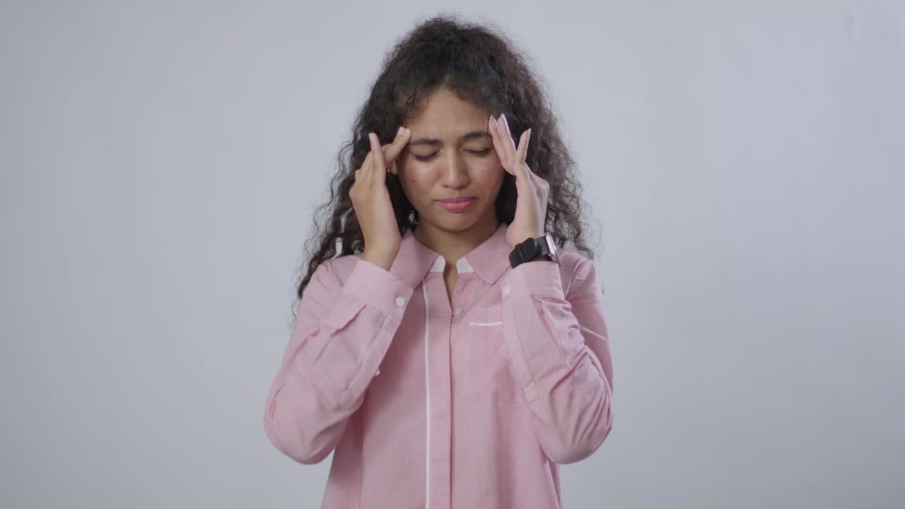 Woman suffering from headache and stress