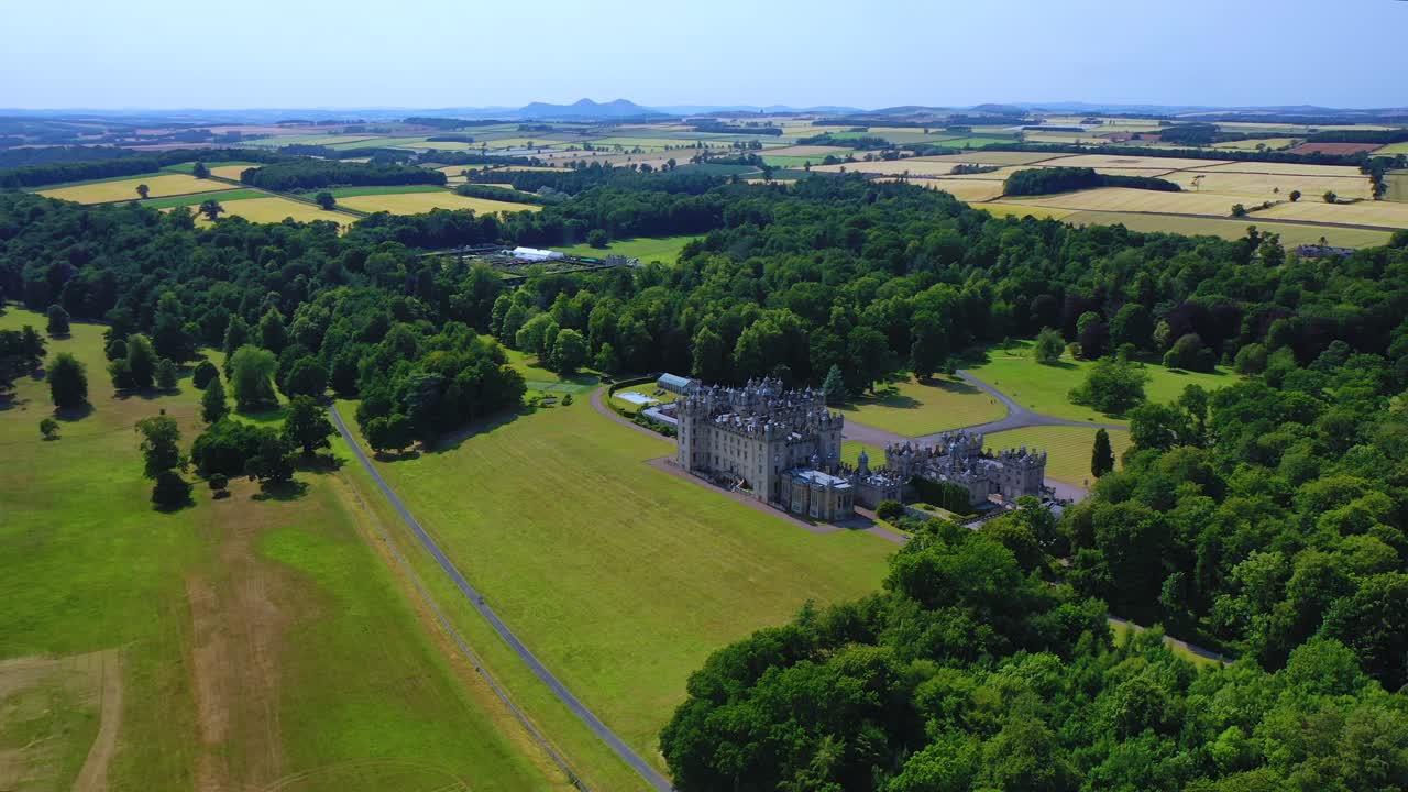 Aerial view of Floors Castle and its extensive estate in the Scottish countryside