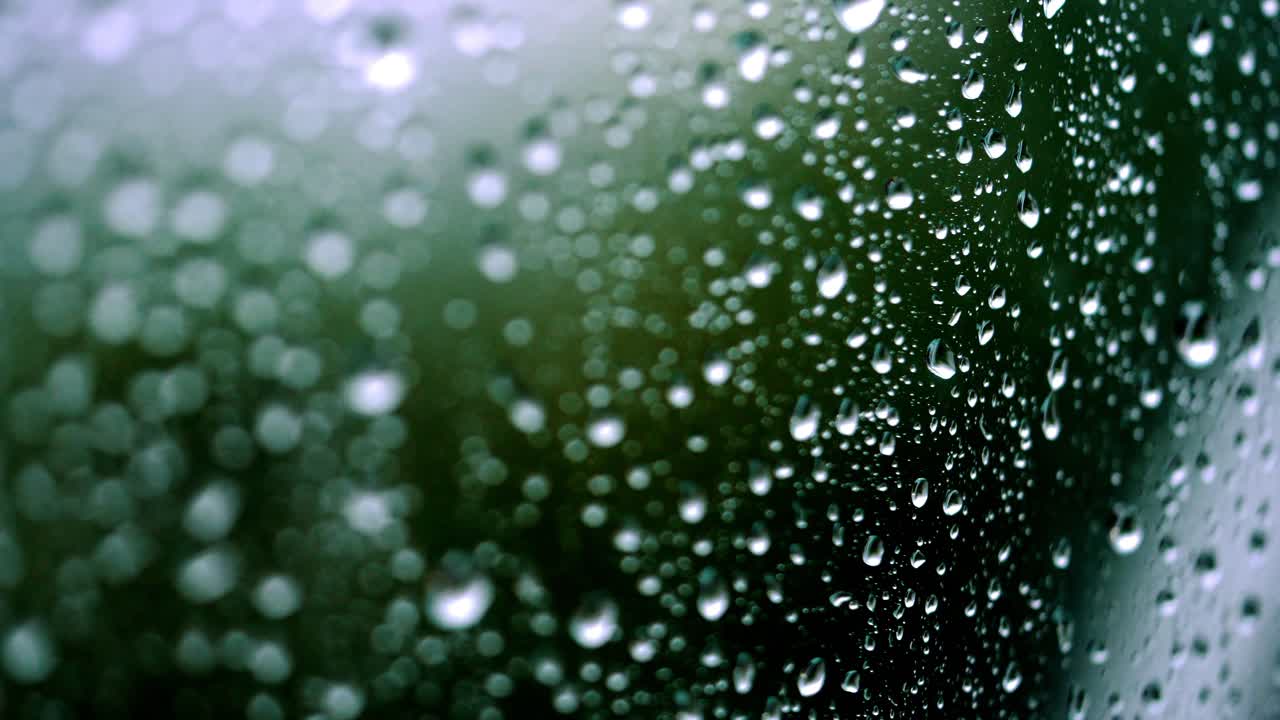 rain days, heavy rain falling on window surface