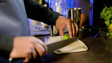 bartender cutting a lime