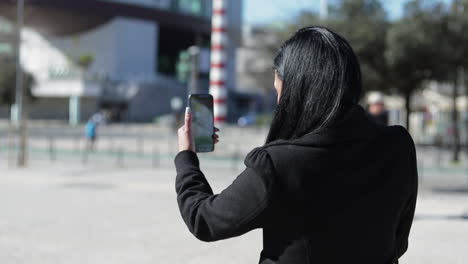 beautiful smiling hindu woman having conversation through phone