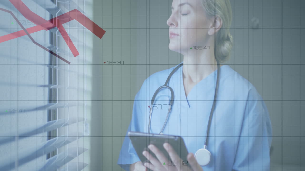 Analyzing financial graph data on tablet, healthcare professional in hospital setting