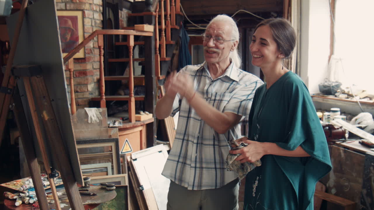Art Teacher and Student in Studio
