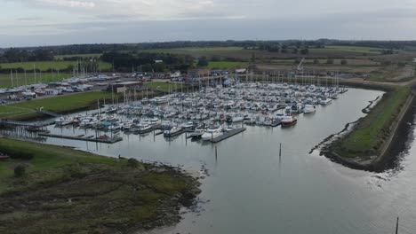 bradwell waterside with moored boats on a cool evening at dusk