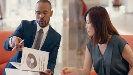 Multi-Ethnic-Business-people-working-in-business-lobby