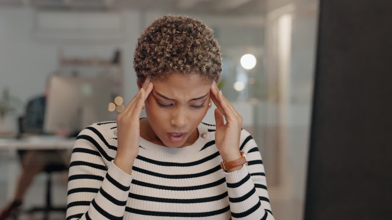 Business, burnout and woman with a headache