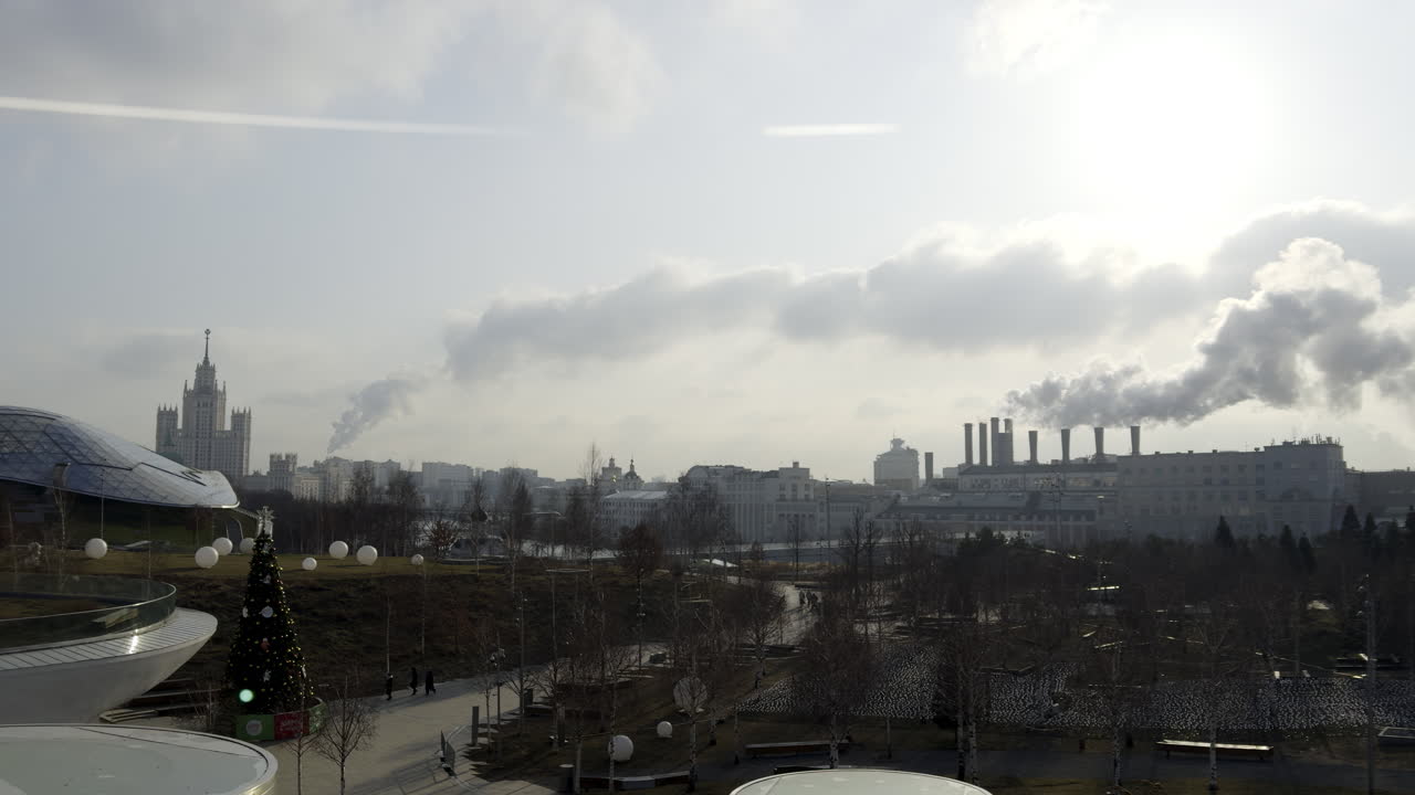 Cityscape with Industrial Smoke in Winter
