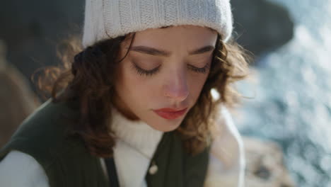 portrait serious girl reading resting vertical shot. focused beautiful woman