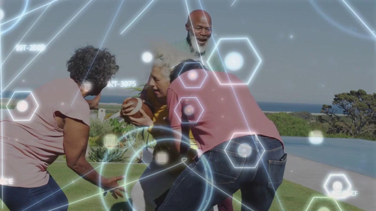 Group circling as senior woman holding ball while team reaching, HUD tracking health for fitness