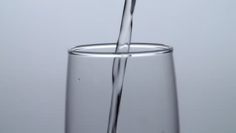 water pouring into a glass