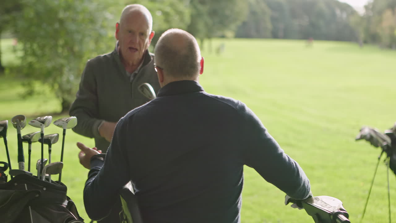 Golfers preparing to play on a golf course