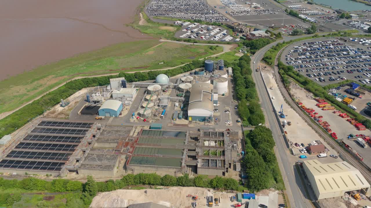 Grimsby England Aerial Drone video of Sewage Management Infrastructure with Piping Network and Silos