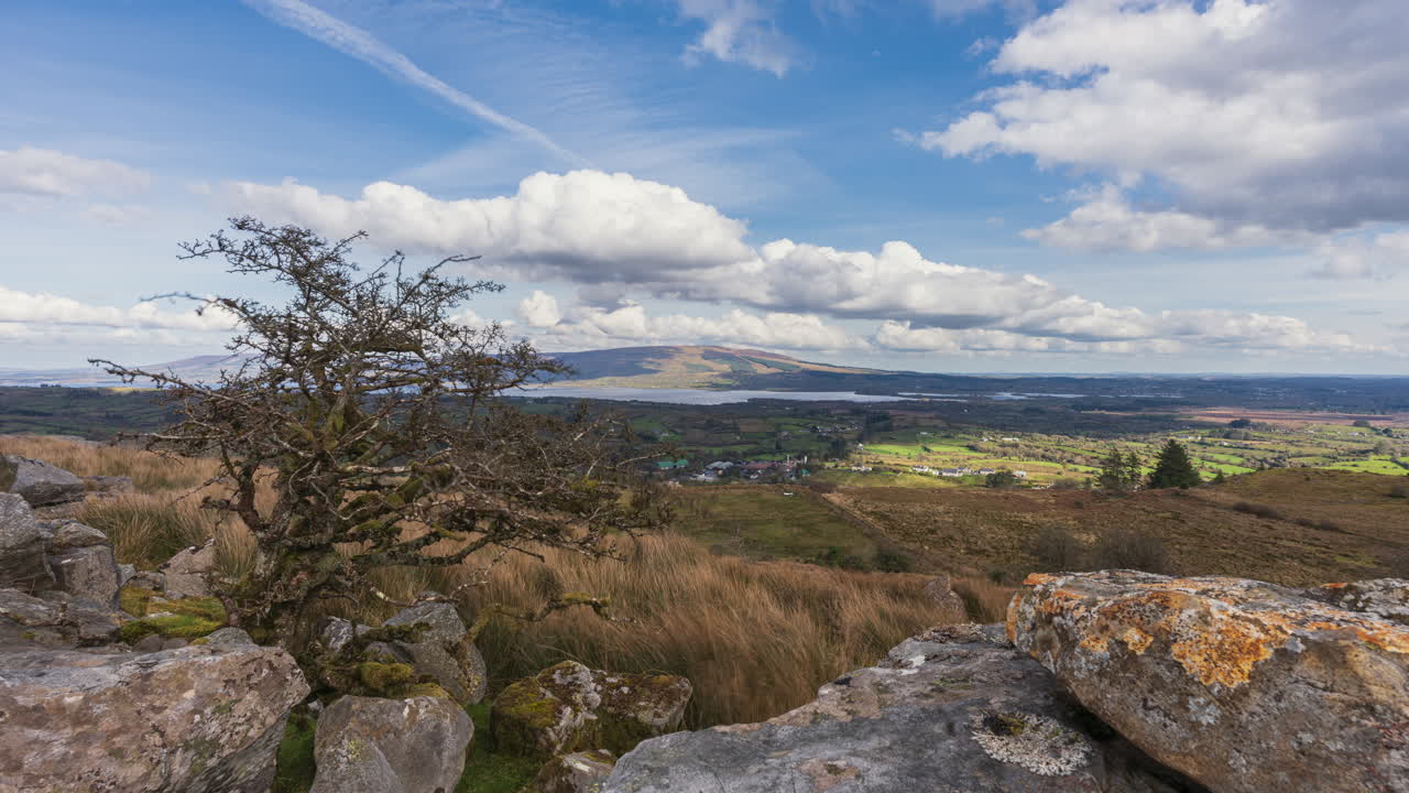Landscape with mountains, lake and clouds