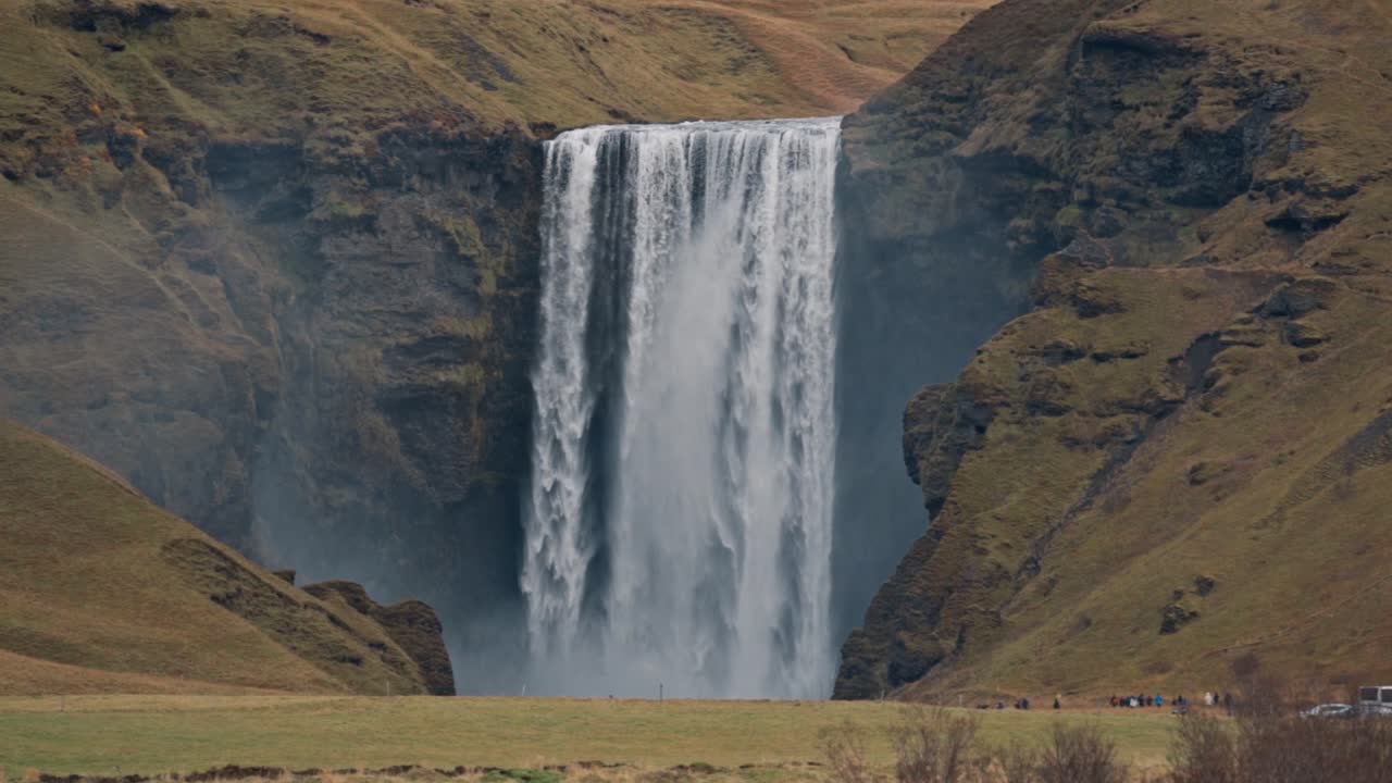 A classic and powerful shot captures the full grandeur of Skógafoss waterfall in Iceland