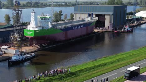 cargo ship enters the water sideways in the netherlands