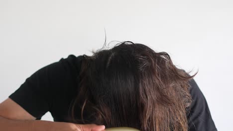 man-using-brush-on-his-head-with-baldness,-Paddle-brush,-latino-man