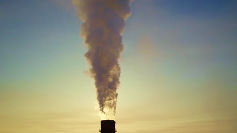 smoke stack emission at sunrise/sunset