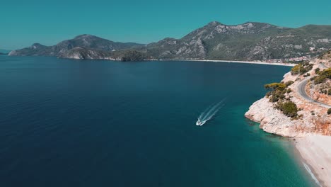 flying over a boat in the mediterranean sea in the turkish coast - ölüdeniz - turkey