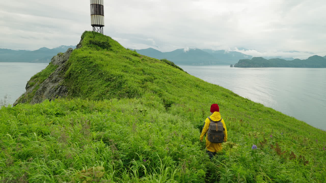 Hiking on a green island with a lighthouse