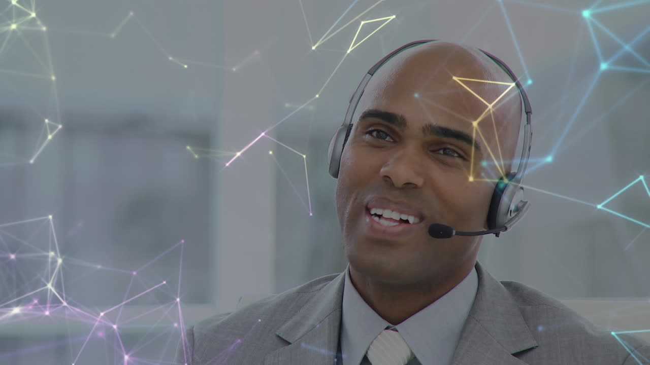 Animation of network of connections over businessman with headset in office
