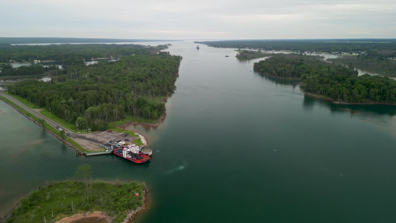 Aerial View of a Ferry and Ship in a Scenic Waterway