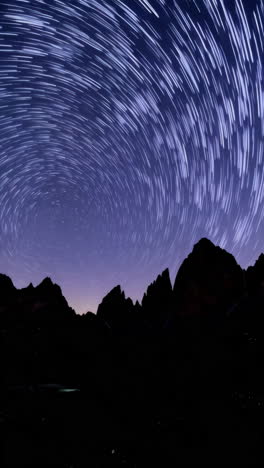 star trails over mountains