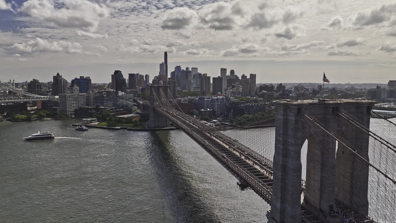 NYC New York Aerial v419 drone flyover along Brooklyn bridge towards waterfront parks capturing river crossing traffics and downtown cityscape views - Shot with Mavic 3 Pro Cine - September 2023