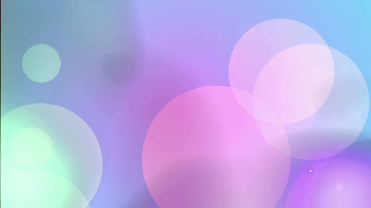 어두운 배경에 있는 컬러 디스크의 애니메이션