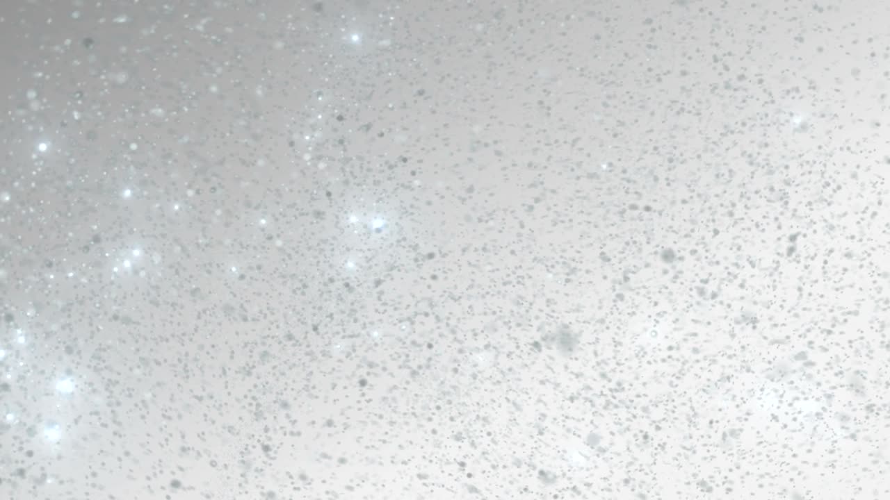 las partículas brillantes blancas vuelan en el viento.