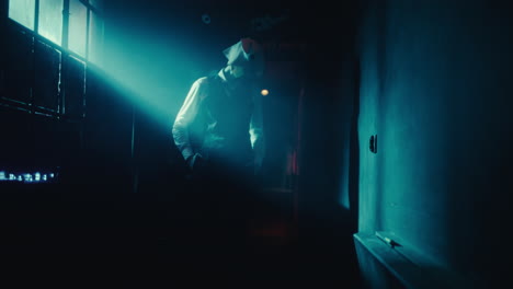 mysterious figure in a dark corridor