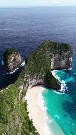 iconic kelingking beach and cliff in nusa penida, aerial vertical view