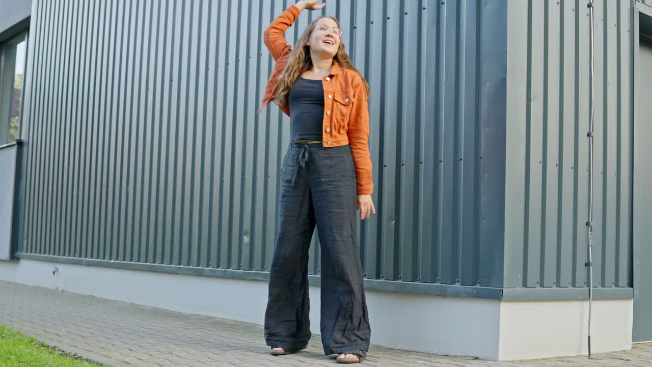 Joyful Blonde with Glasses Dancing Freely, Radiating Pure Happiness and Joy