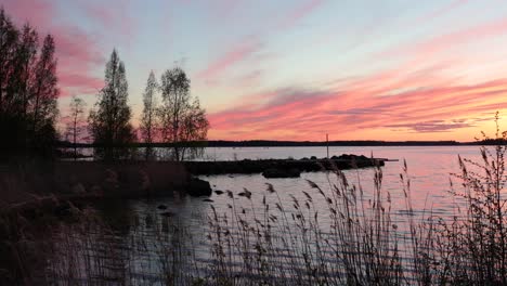 crimson sunset on the background of the gulf of bothnia