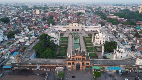 drone shot of chota imambada, featuring its magnificent dome and surrounding grounds in the early morning glow.