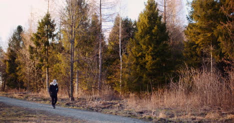 Female-Tourist-Walking-On-A-Trail-In-Mountains-4