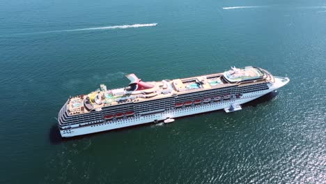 Aerial-drone-shot-large-luxury-cruise-ship-sailing-on-coast-of-Mexico